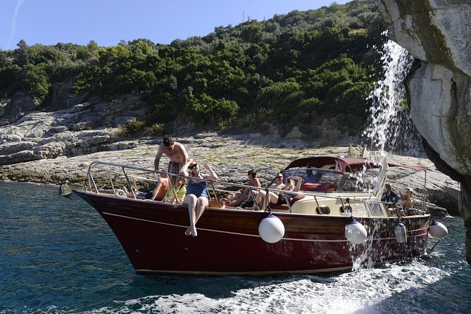 Small Group Boat Tour Capri & Blue Grotto with Swimming Stops - Lunch, limoncello, and what is really included