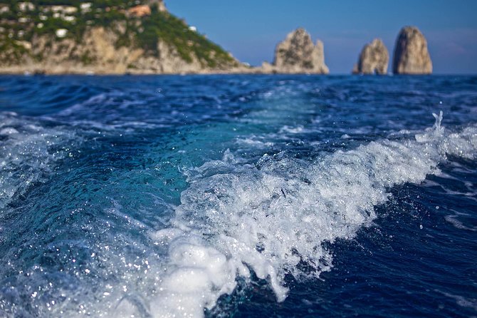 Small Group Capri Island Boat Ride with Swimming and Limoncello - Entering the Green Grotto for photos