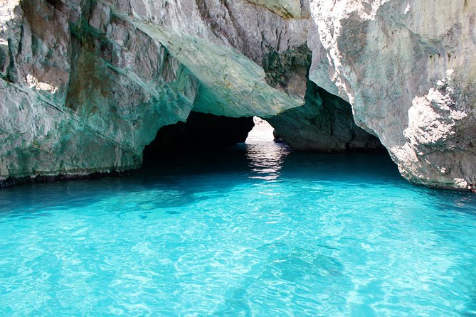 Small Group Capri Island Boat Ride with Swimming and Limoncello - The Natural Arch and Villa Malaparte