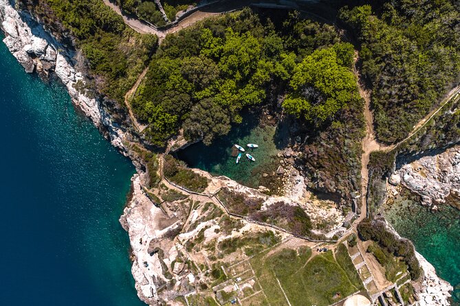 Small group paddle boarding tour to Bagni Regina Giovanna - Sunset departures and timing choices