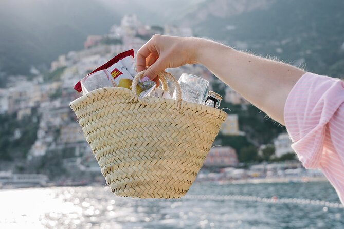Small Group Tour in Positano by Boat at Sunset with Prosecco - The ride back to Positano in evening light