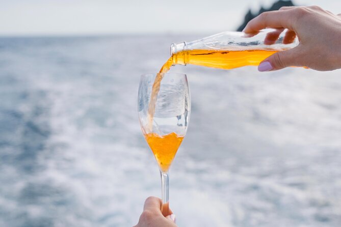 Small Group Tour in Positano by Boat at Sunset with Prosecco - What is included for the $81.88 price