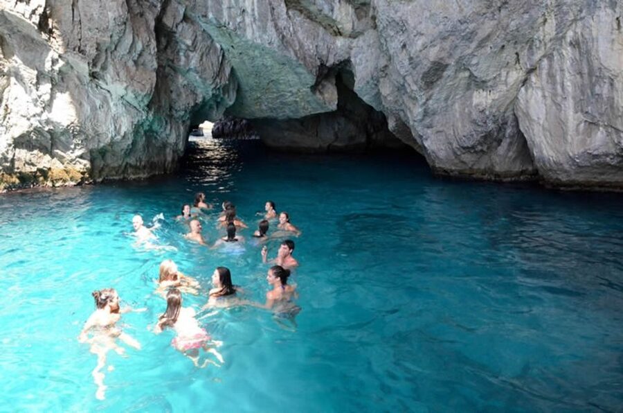 Sorrento: Capri and Blue Grotto Boat Cruise with Drinks - Drinks, snacks, and the onboard mood