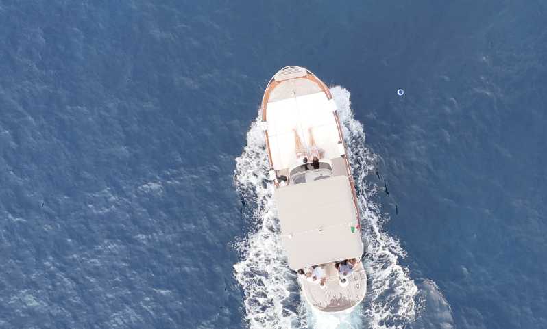 Sorrento: Capri and Blue Grotto Yacht Tour with Snorkeling - The 30-minute crossing from Sorrento