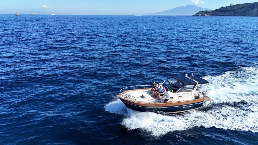 Sorrento: Capri and Blue Grotto Yacht Tour with Snorkeling - Faraglioni and the Natural Arch