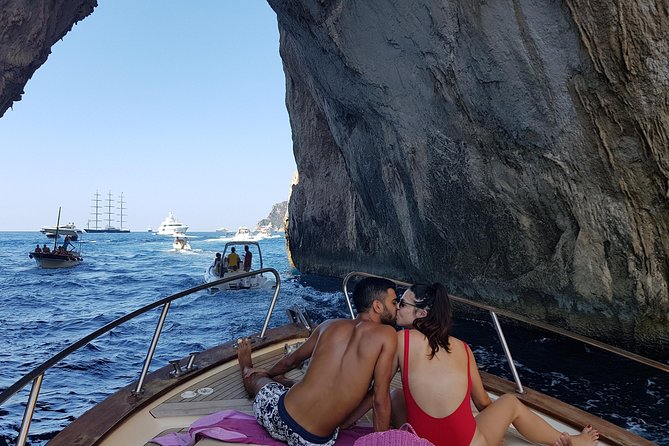 Sorrento: Capri Select Boat Trip with Swim, Drinks & Pick Up - Anacapri’s lighthouse and the island from offshore