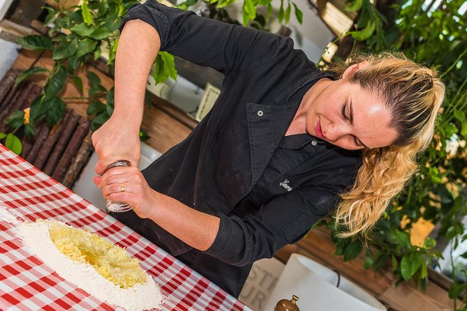 Sorrento: Hands-On Pasta, Tiramisu & Limoncello Fun Class - A garden visit before the cooking begins