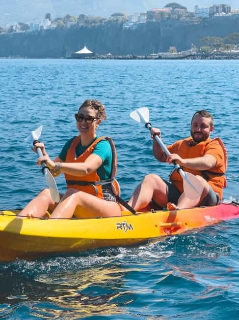 Sorrento: kayak small group tour to Bagni Regina Giovanna - Paddling beneath Sorrento’s cliffs