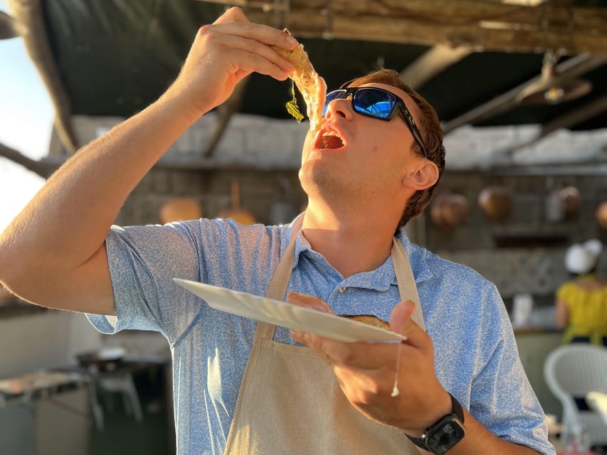 Sorrento: Pizza Class with Sea View - Eating your pizza as the sun sets