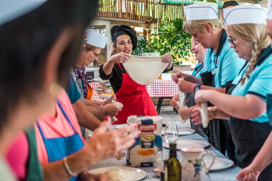 Sorrento: Pizza Making Class at Tirabusciò Cooking School - Choosing toppings and using the pizza oven