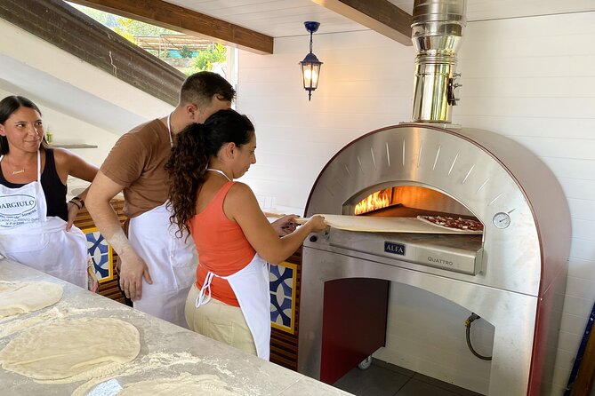 Sorrento Pizza School Activity in Italy - Learning to stretch and top your own pizza