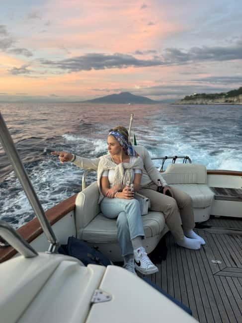 Sorrento: Sunset Coastal Boat Tour with Aperitif - Cruising past Marina Grande and Puolo Beach