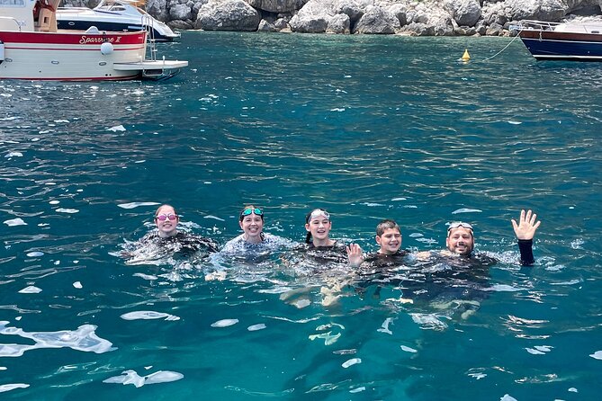 Sorrentomaxiboat tours to Capri - Swimming, snorkeling, and a cooler on board
