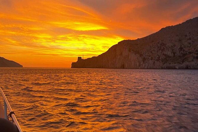Sunset Luxury: Capri on fire - Leaving Porto di Sorrento for Capri