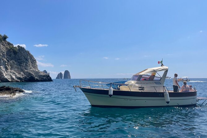 Three Hour Private Guided Tour of Capri with a luxury Gozzo cabin cruiser - A Little Capri Good Luck From Gennarino