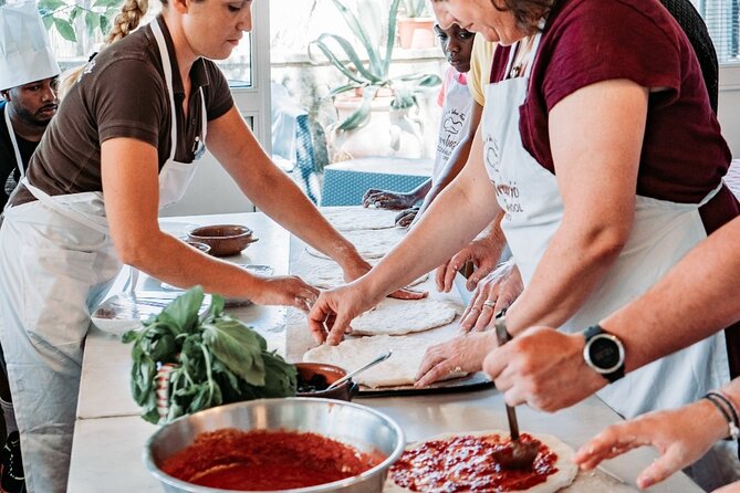 Toss, Bake, Cheers! - Sorrento Pizza Making Class with Wine - Olive oil and mozzarella before the oven