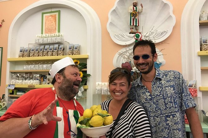 Walking Food Tour in Sorrento w/ Limoncello Factory Lemon Grove - Sitting down for pasta, salad, and wine
